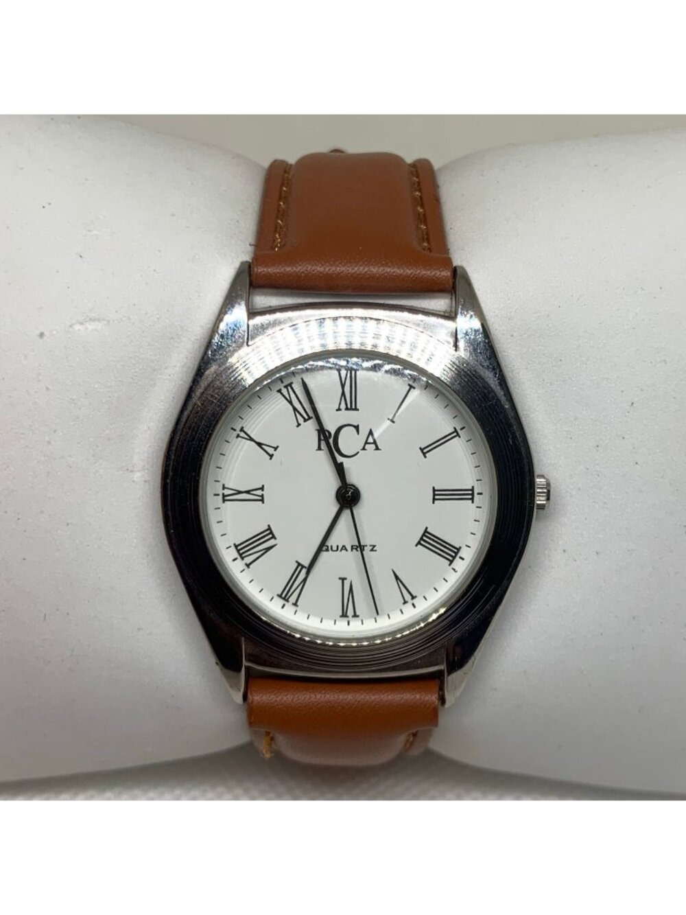 PCA Swiss parts quartz analog watch silver tone 34mm brown leather band running